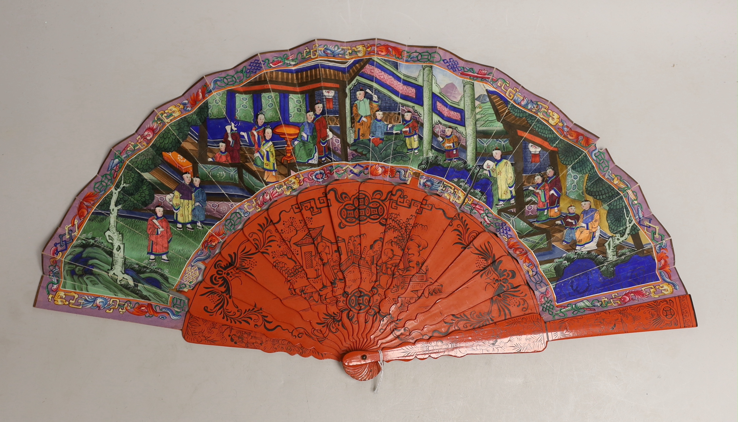 A Chinese hand painted figural fan with applied ivory faces and red lacquered guards, and boxed both damaged CITES Submission reference ERW33PQG